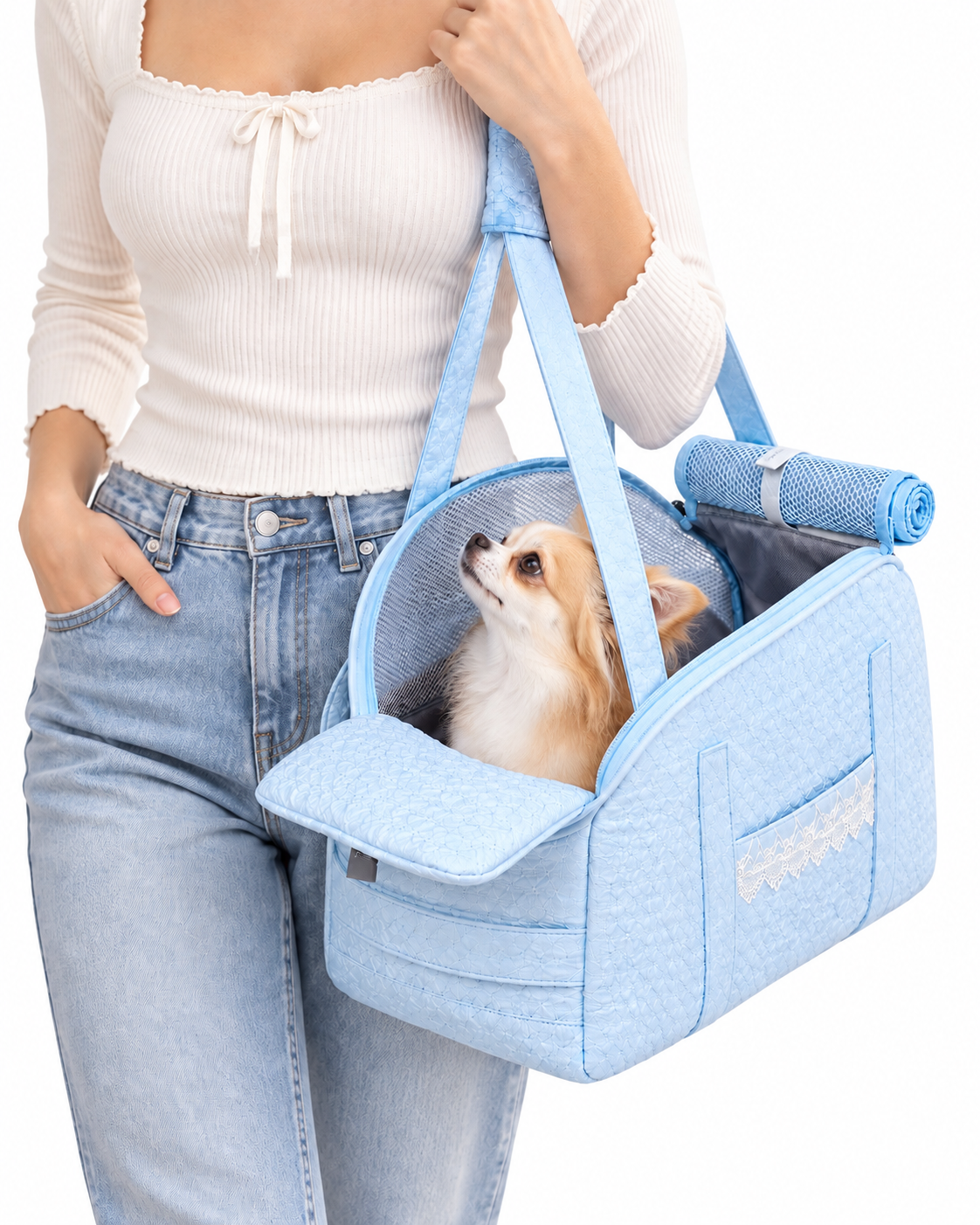 Nuzziva CloudQuilt blue pet tote carried with a corgi [variant:NUZ-CLOUDQUILT-BLUE] lifestyle