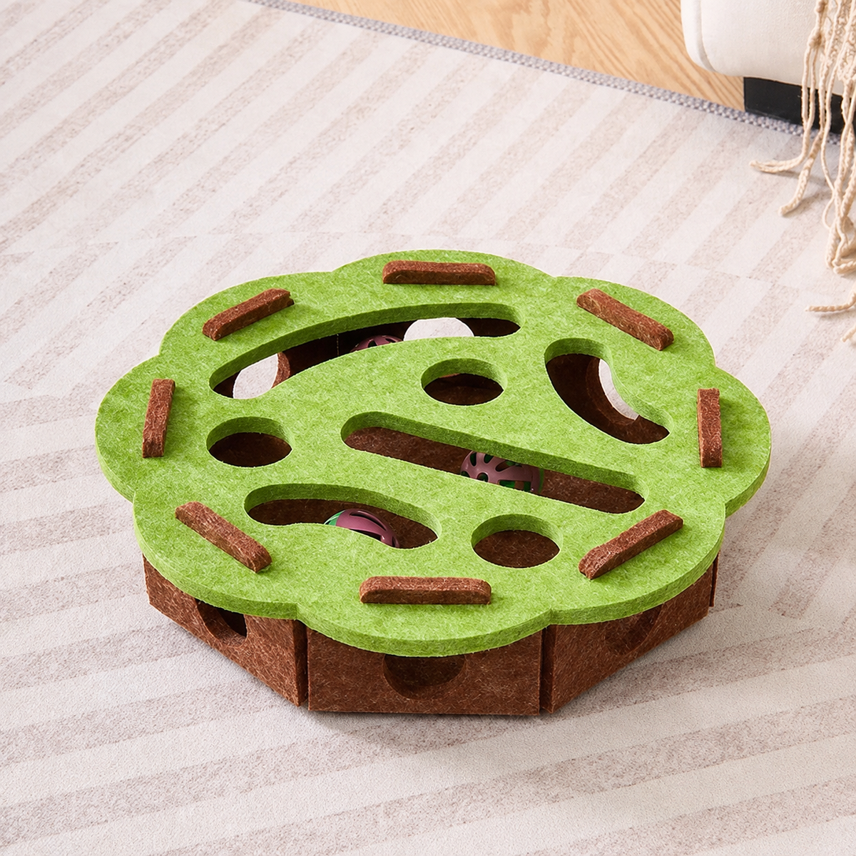 Round Peek & Pounce felt cat puzzle maze in Catnip Green
